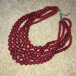 Red beaded statement necklace.